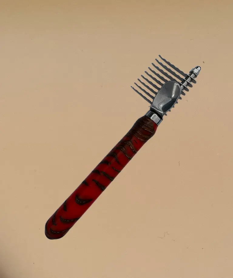 Pet de-matting comb in Pinecones & Orange Resin
